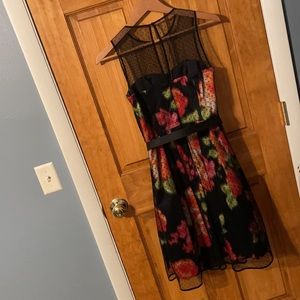 Like new. Eliza J sz 0. Black polka dot overlay dress with orange/yellow pattern